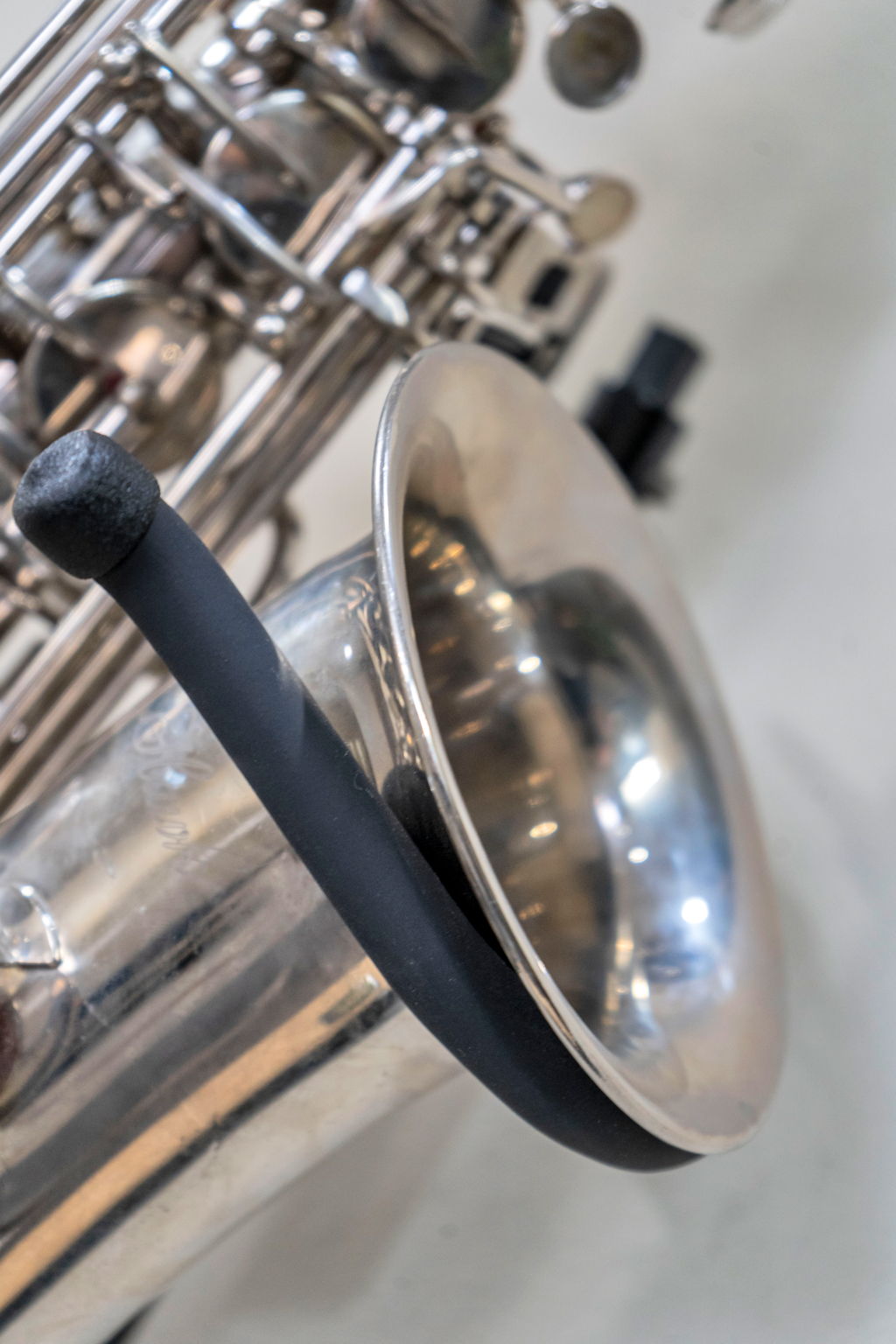 A close-up of the saxophone in The Reed suite