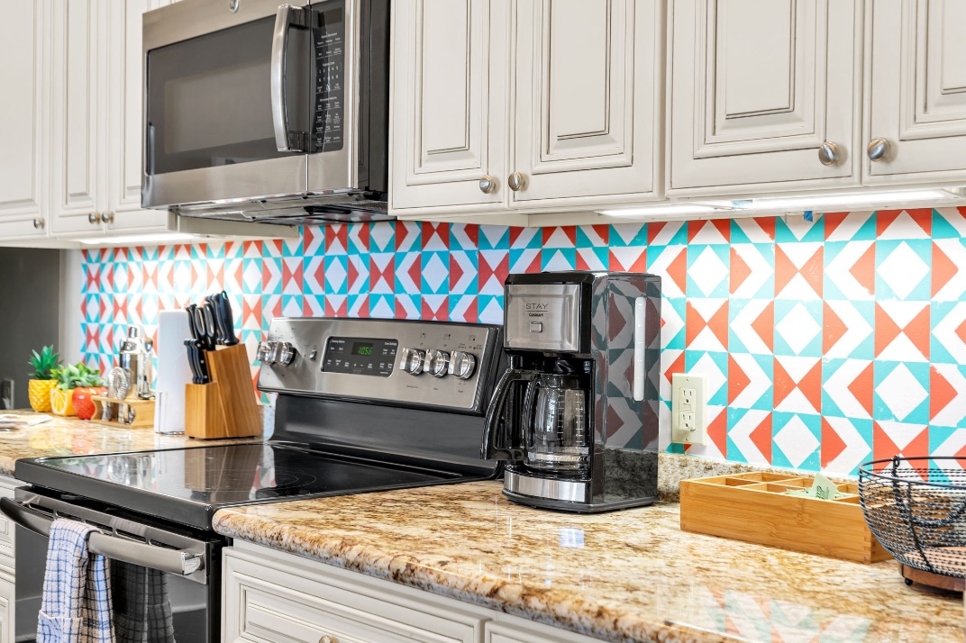 The coffee maker on the kitchen counter in The Slide suite