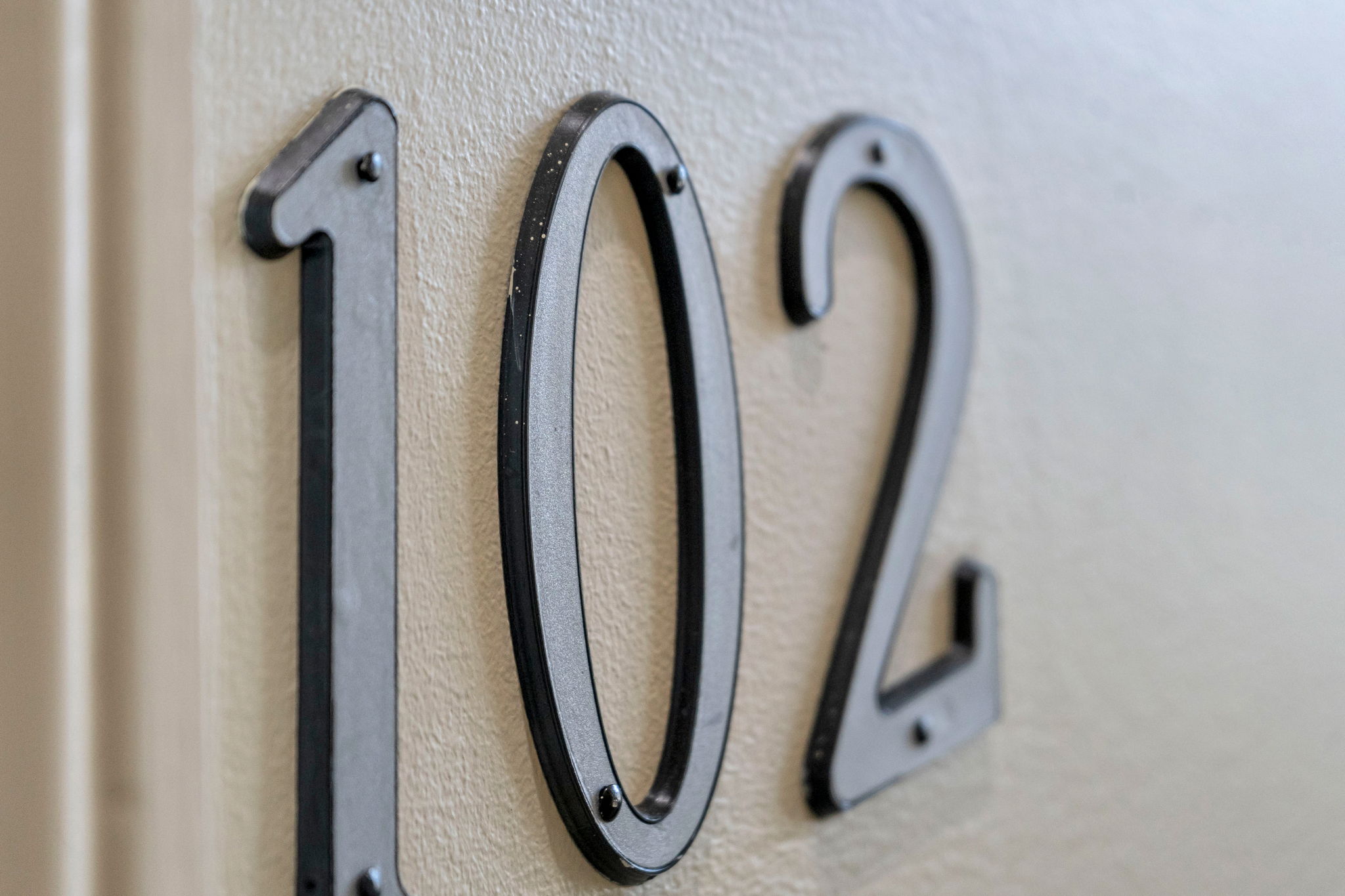 The 102 door number in The Slide suite