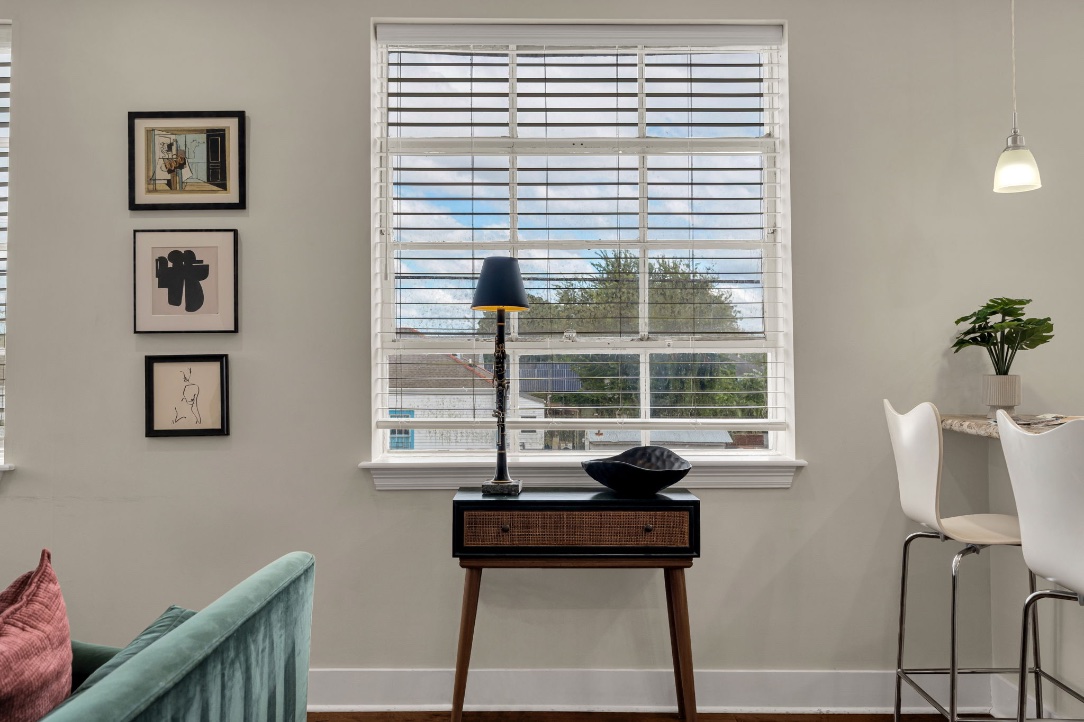 A clarinet lamp on a side table in The Licorice suite