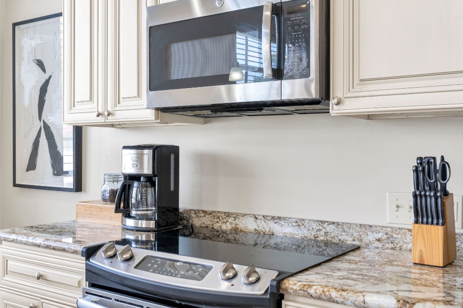 The stove and coffee maker in The Licorice suite kitchen